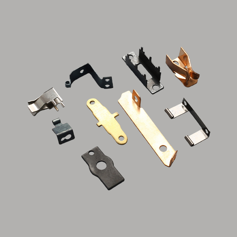 How can the surface roughness of brass spring electrical contacts be optimized to reduce contact resistance and suppress arc reignition?